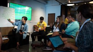 Group of people exchanging ideas.